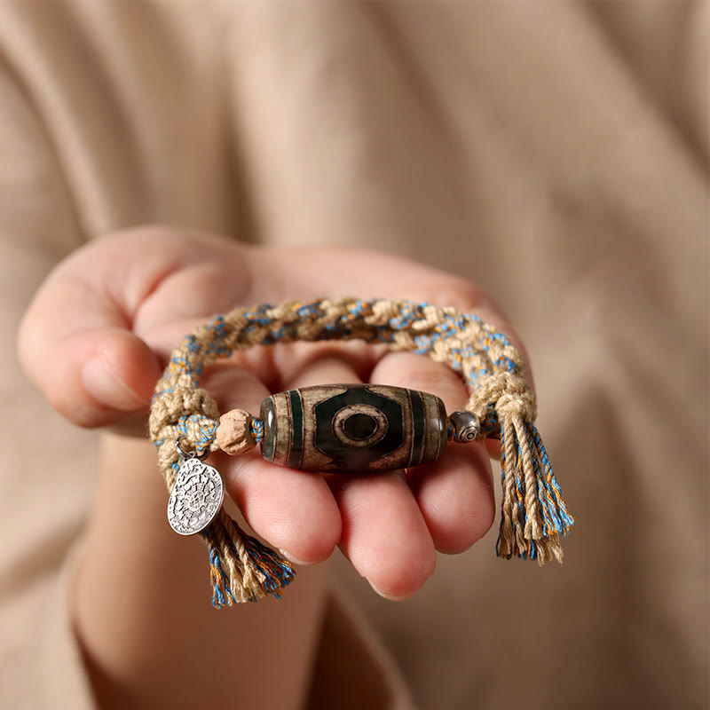 Pulsera trenzada de cuentas Dzi tibetanas hechas a mano con Buddha Stones para proteger la riqueza - image 5