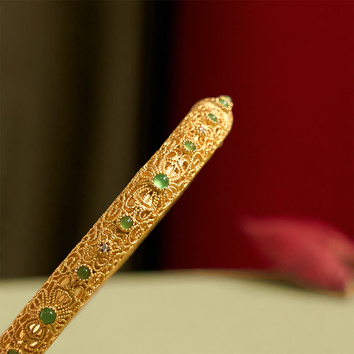 Pulsera de la riqueza con diseño de filigrana hueca y Buddha Stones bañadas en cobre y oro