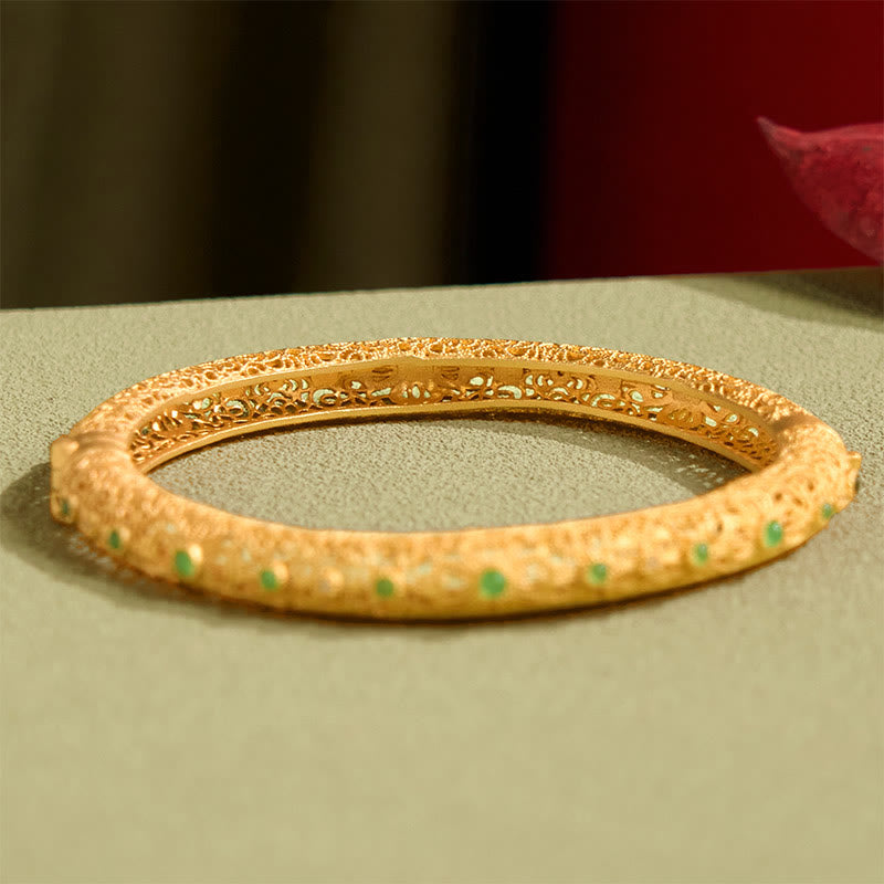 Pulsera de la riqueza con diseño de filigrana hueca y Buddha Stones bañadas en cobre y oro