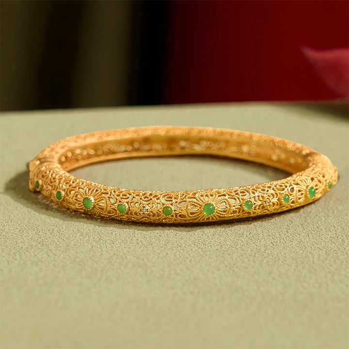 Pulsera de la riqueza con diseño de filigrana hueca y Buddha Stones bañadas en cobre y oro
