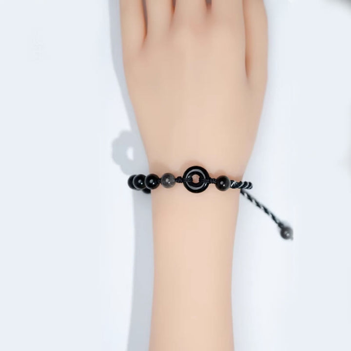 Buddha Stones Pulsera de cuerda negra purificadora con hebilla de paz de obsidiana negra natural