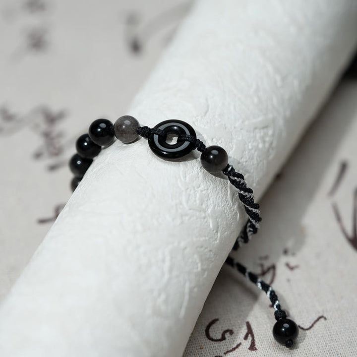 Buddha Stones Pulsera de cuerda negra purificadora con hebilla de paz de obsidiana negra natural