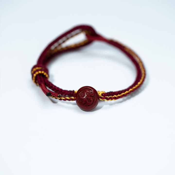 Pulsera trenzada de ocho hilos con cuentas de cinabrio y nudo de flor de durazno con Buddha Stones - image 2