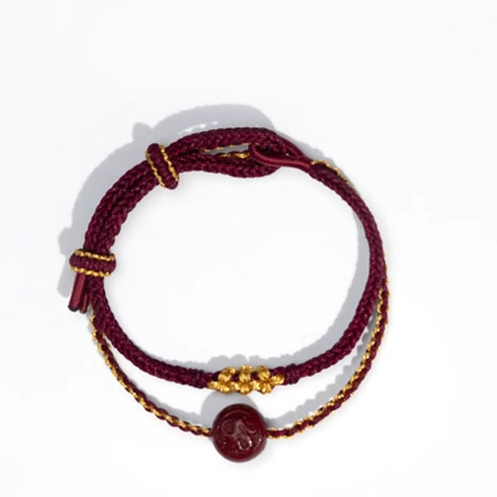 Pulsera trenzada de ocho hilos con cuentas de cinabrio y nudo de flor de durazno con Buddha Stones - image 9