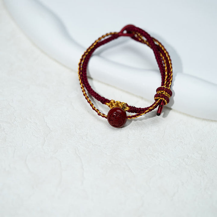 Pulsera trenzada de ocho hilos con cuentas de cinabrio y nudo de flor de durazno con Buddha Stones - image 3