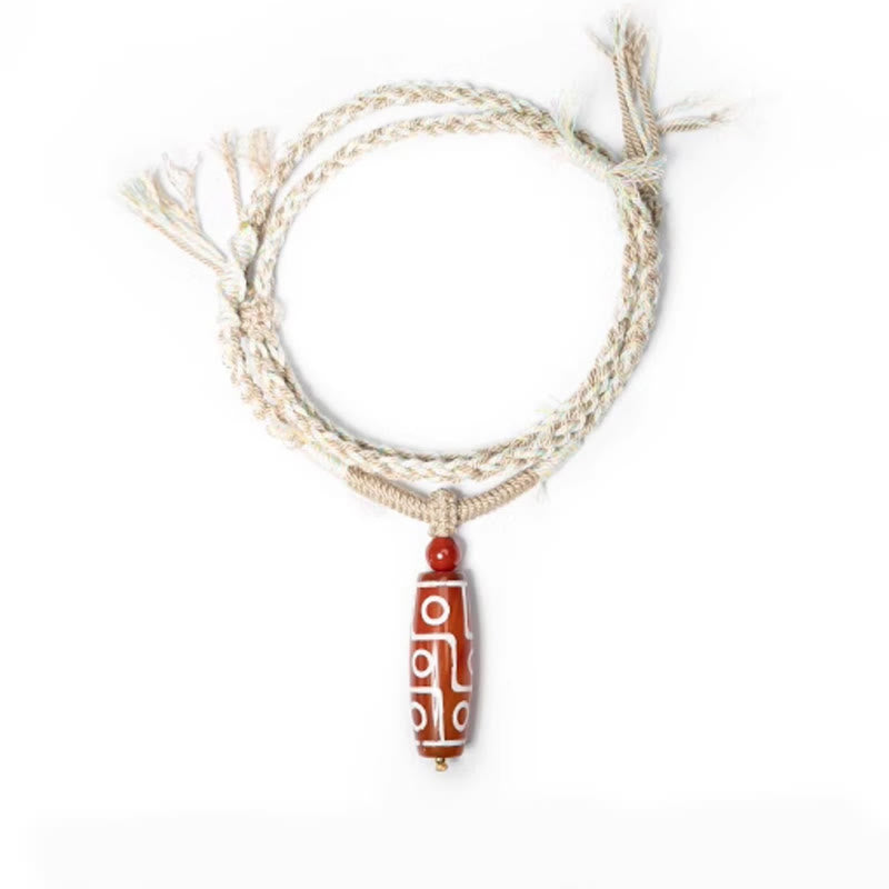 Pulsera de cuerda de energía con cuentas Dzi de nueve ojos de ágata roja natural de Buddha Stones - image 10