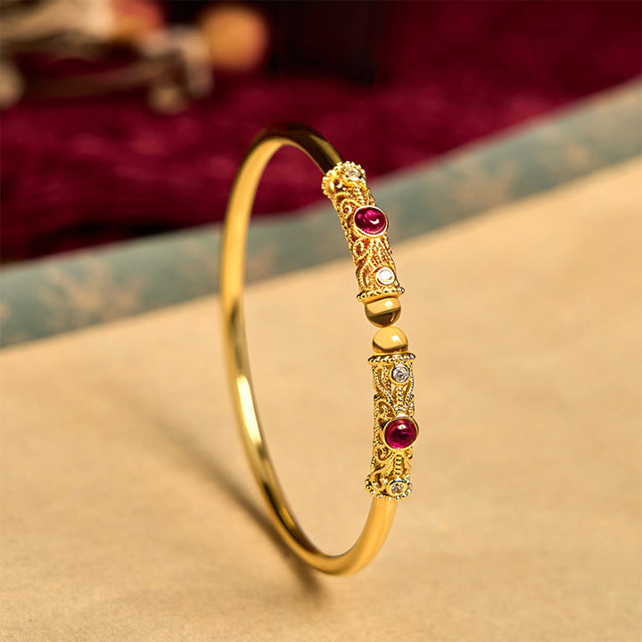 Brazalete de la suerte con Buddha Stones, diseño de flores doradas, circonita roja, ámbar y cobre - 60 mm - image 1