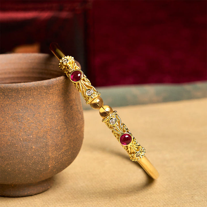 Brazalete de la suerte con Buddha Stones, diseño de flores doradas, circonita roja, ámbar y cobre - image 2