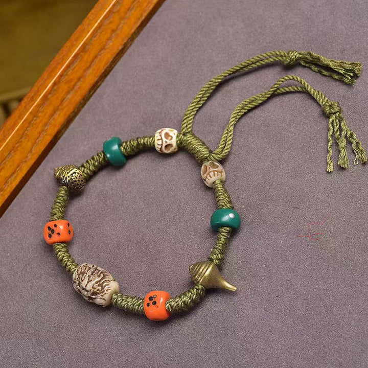 Pulsera de cuerda hecha a mano con dados y diseño de dragón tibetano de Buddha Stones - Cuerda verde (circunferencia de la muñeca: 16-20 cm) - image 0