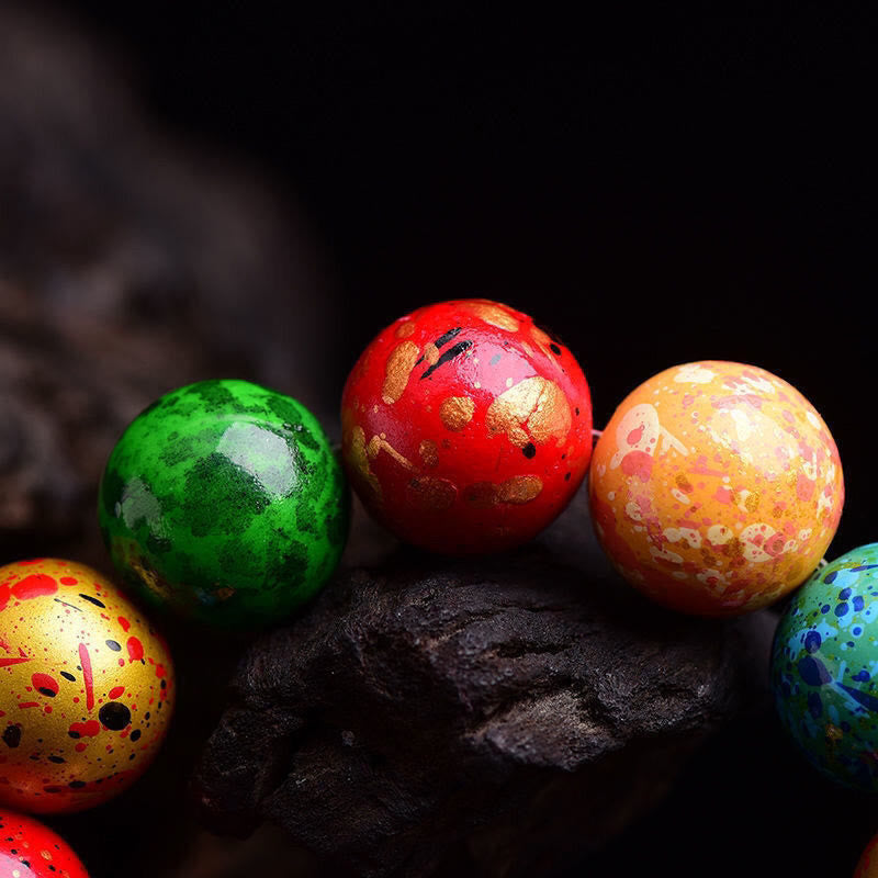 Pulsera protectora de cuentas de sándalo con laca multicolor y Buddha Stones - image 3