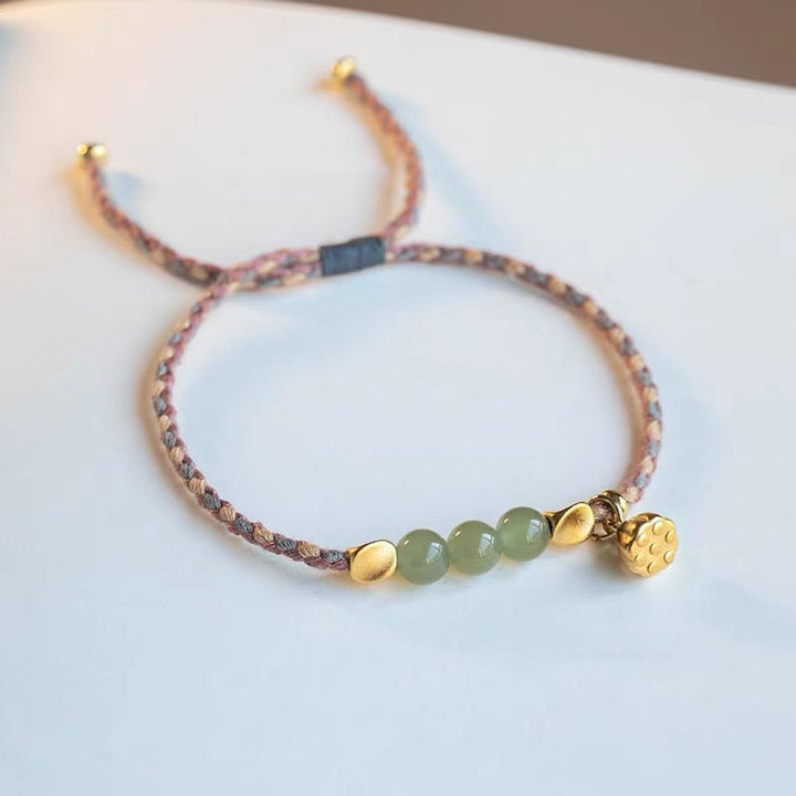 Pulsera trenzada de la suerte con dije de loto de jade hetiano hecho a mano con Buddha Stones