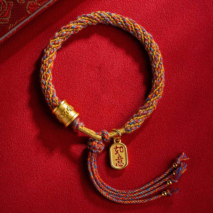 Pulsera trenzada con dije auspicioso de Om Mani Padme Hum tibetano multicolor hecho a mano con Buddha Stones