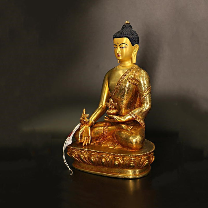 Estatua decorativa chapada en oro y cobre de la compasión del Buda de la medicina Shakyamuni