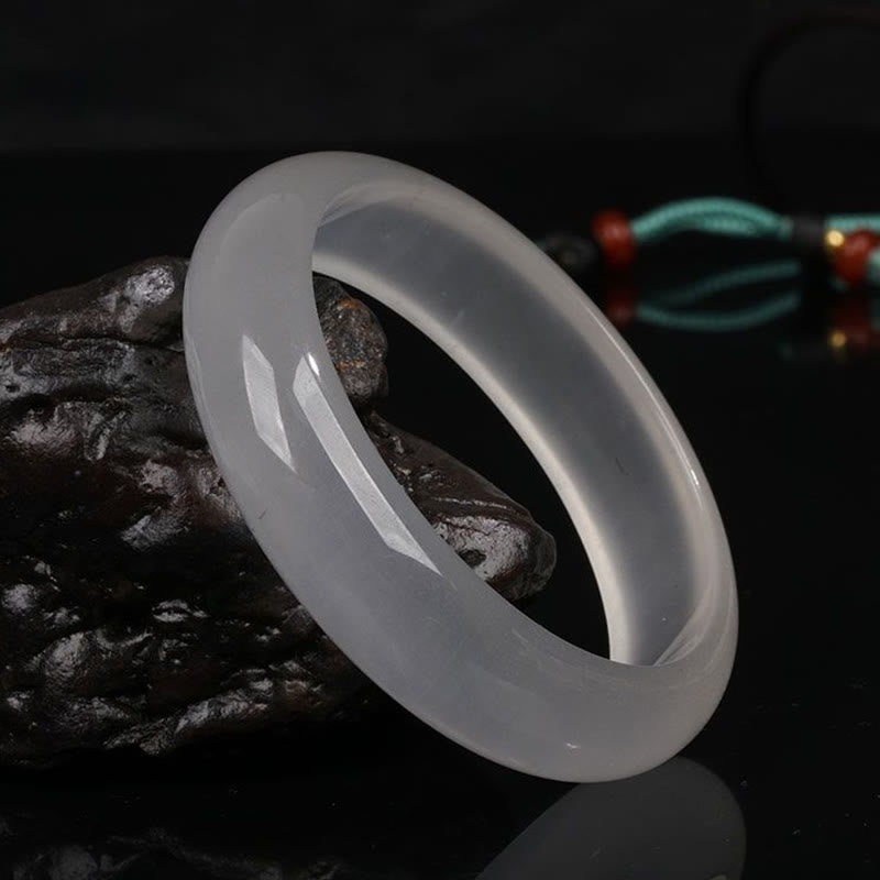 Pulsera de la suerte de la riqueza del jade de seda dorada translúcida natural de las Buddha Stones