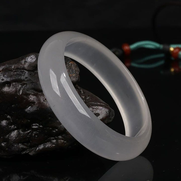 Pulsera de la suerte de la riqueza del jade de seda dorada translúcida natural de las Buddha Stones