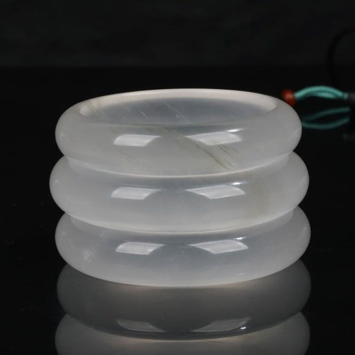 Pulsera de la suerte de la riqueza del jade de seda dorada translúcida natural de las Buddha Stones