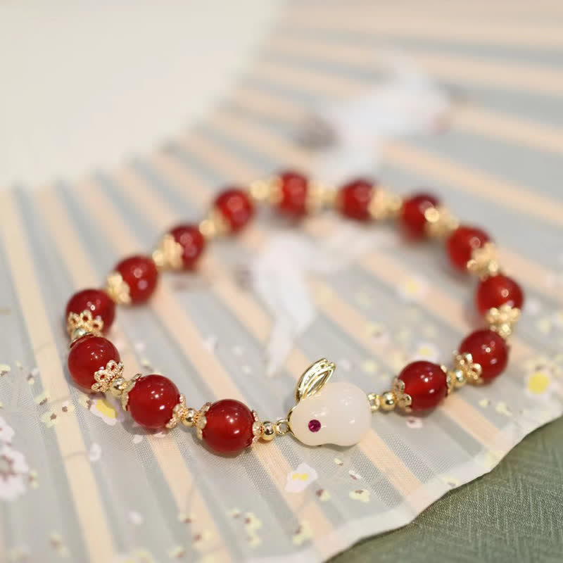 Pulsera de confianza de jade blanco y ágata roja natural del año del conejo