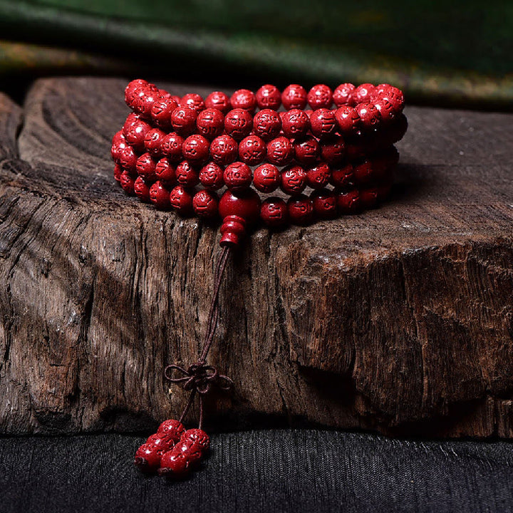 Buddha Stones 108 cuentas Mala cinabrio Om Mani Padme Hum patrón grabado pulsera de bendición