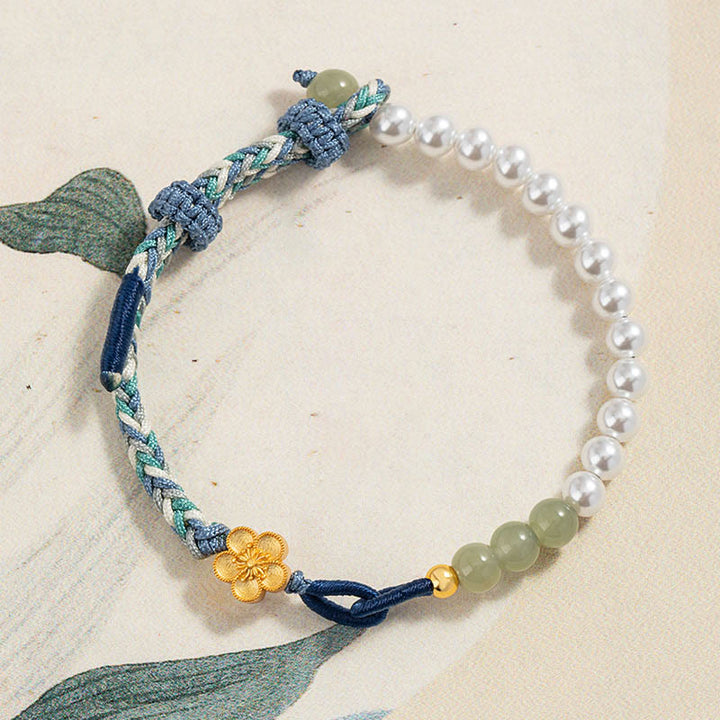 Pulsera de la suerte trenzada con perlas de flor de melocotón y jade hetiano de plata de ley 925 con Buddha Stones