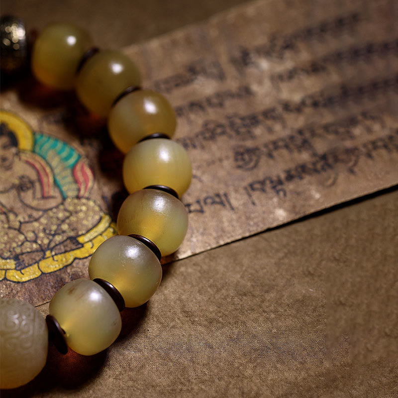 Pulsera auspiciosa hecha a mano con Buddha Stones , cuerno de oveja tibetano, Om Mani Padme Hum