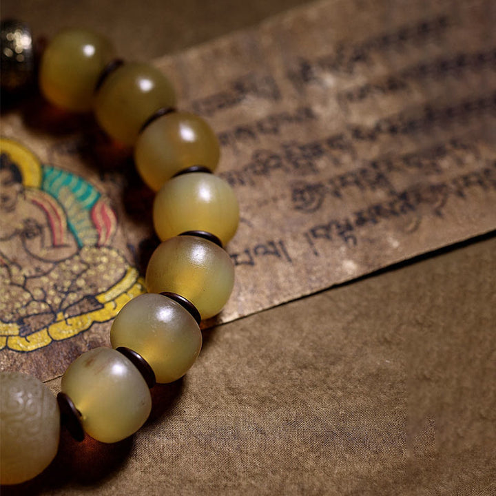 Pulsera auspiciosa hecha a mano con Buddha Stones , cuerno de oveja tibetano, Om Mani Padme Hum