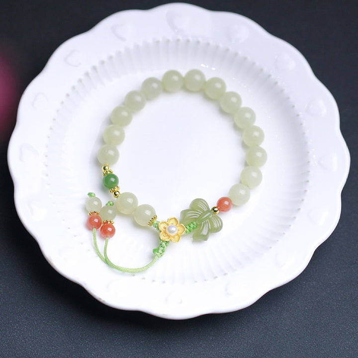 Pulsera de mariposa y flor de la suerte de jade de plata de ley 925 con Buddha Stones