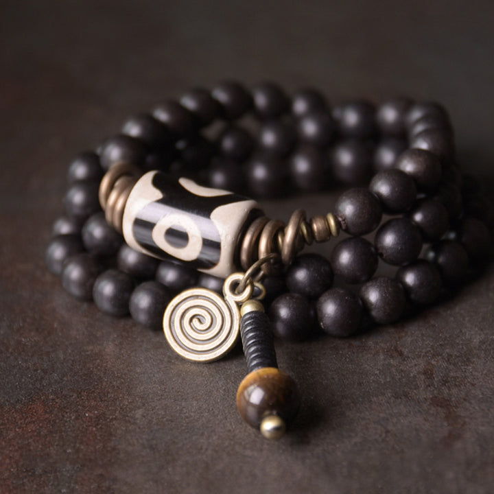 Pulsera de pareja de protección de cobre con cuentas Dzi de madera de ébano y Buddha Stones