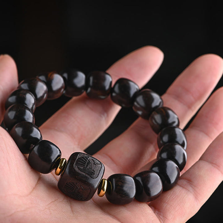 Pulsera de equilibrio de la suerte y el tesoro, cuentas de barril de madera de ébano tibetano, Buddha Stones