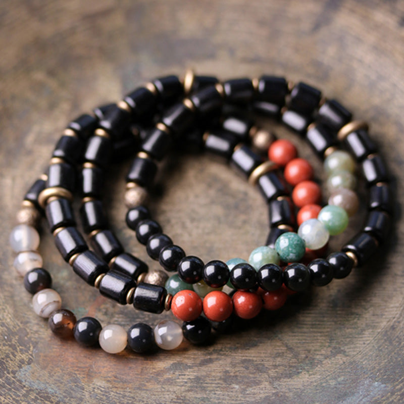 Pulsera de pareja de paz con Buddha Stones, madera de ébano, jaspe rojo, ágata de musgo, cristal, cobre