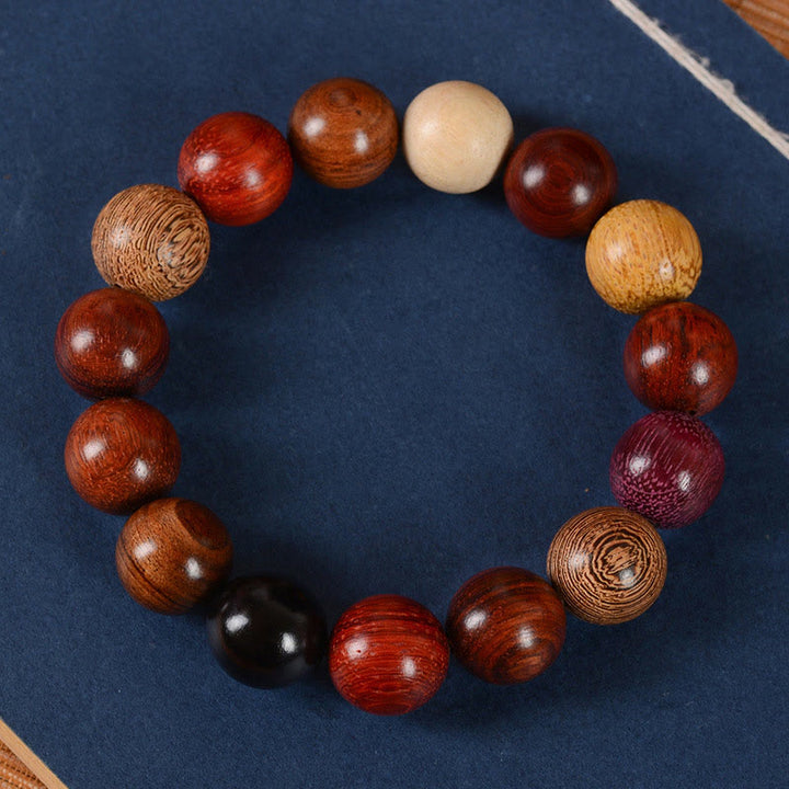 Pulsera curativa de protección de sándalo multicolor con Buddha Stones