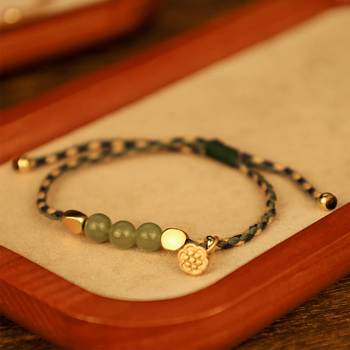 Pulsera trenzada de la suerte con dije de loto de jade hetiano hecho a mano con Buddha Stones