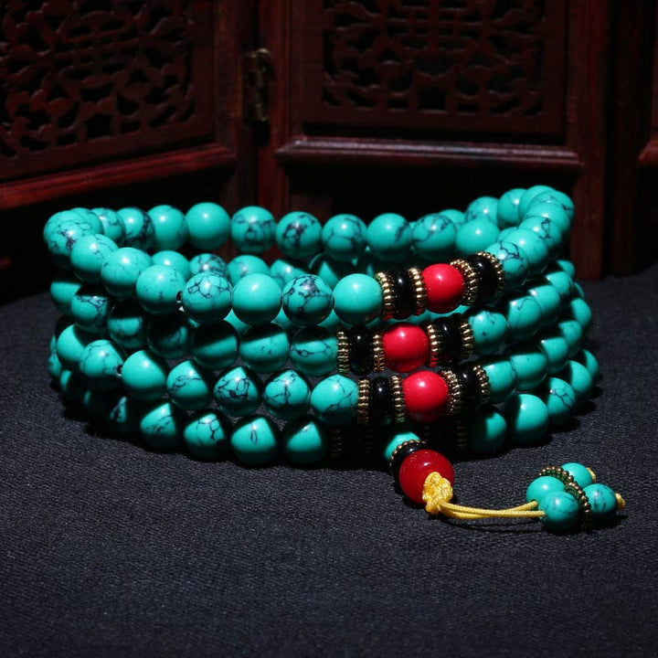 Pulsera Mala curativa de turquesa tibetana con Buddha Stones