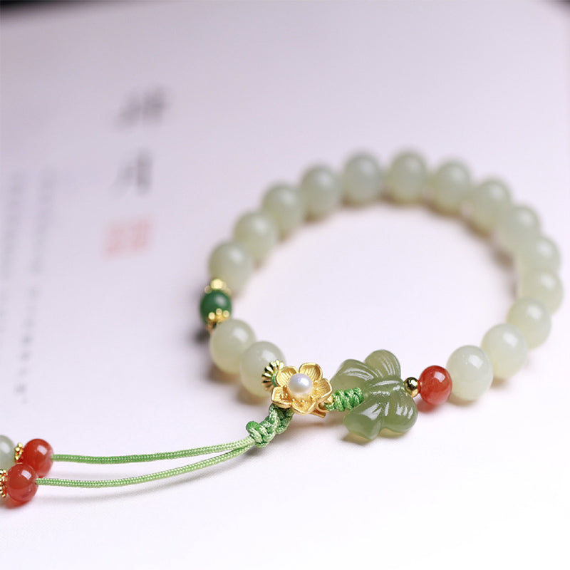 Pulsera de mariposa y flor de la suerte de jade de plata de ley 925 con Buddha Stones
