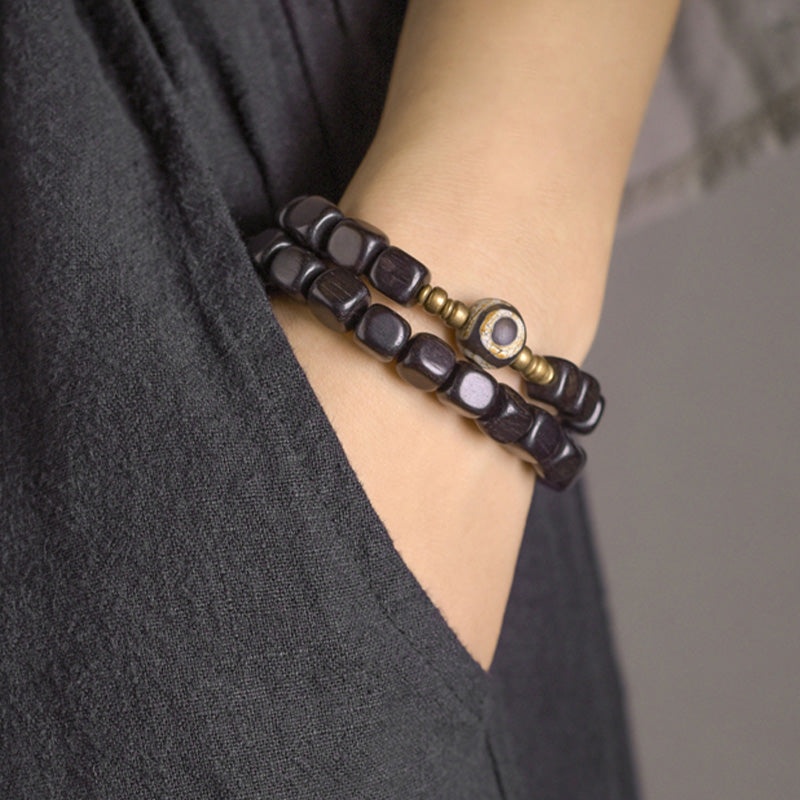 Pulsera de pareja de paz de cobre con cuentas Dzi de madera de ébano
