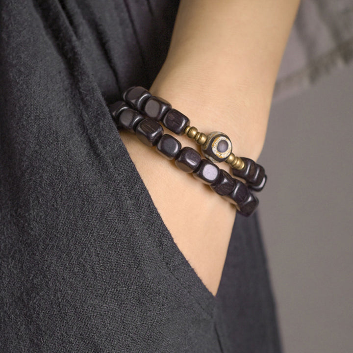 Pulsera de pareja de paz de cobre con cuentas Dzi de madera de ébano
