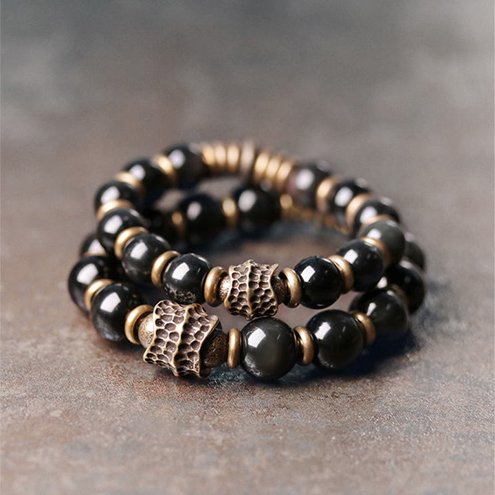 Pulsera curativa de amor de cobre y obsidiana arcoíris con Buddha Stones