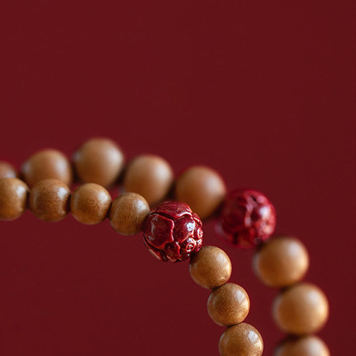 Pulsera de riqueza y suerte con Buddha Stones, madera de melocotón, loto, cinabrio
