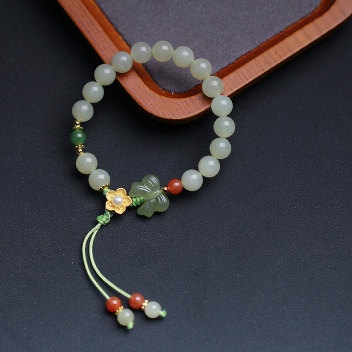Pulsera de mariposa y flor de la suerte de jade de plata de ley 925 con Buddha Stones
