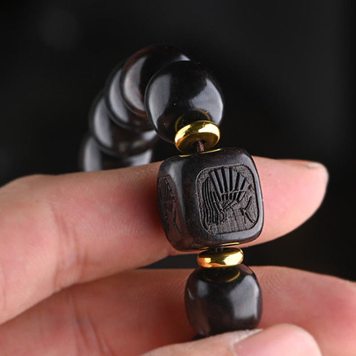 Pulsera de equilibrio de la suerte y el tesoro, cuentas de barril de madera de ébano tibetano, Buddha Stones