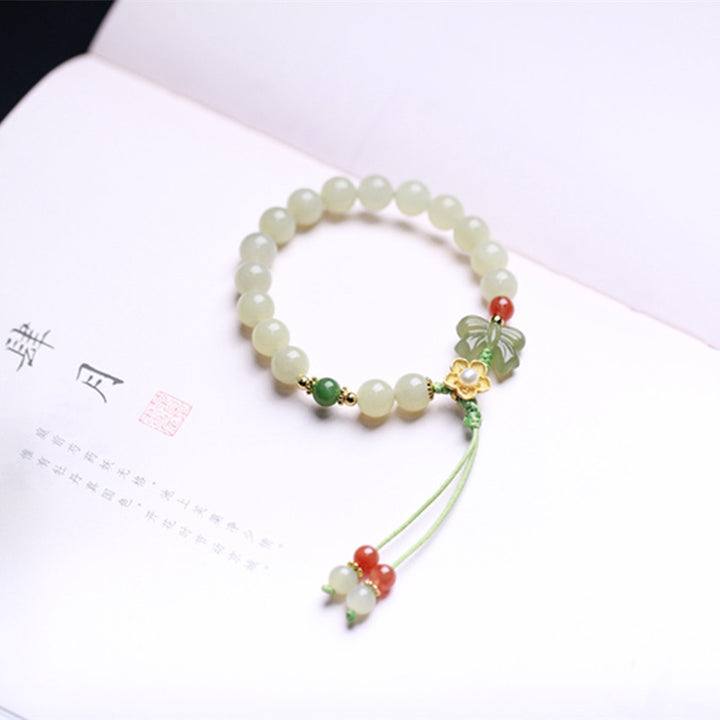 Pulsera de mariposa y flor de la suerte de jade de plata de ley 925 con Buddha Stones
