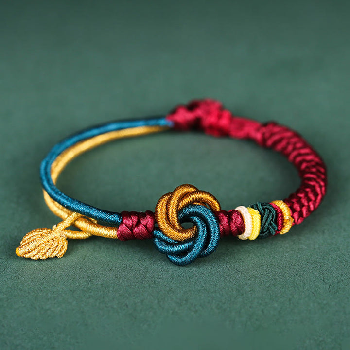 Pulsera de cuerda de la suerte con nudo de mandala hecha a mano tibetana con Buddha Stones