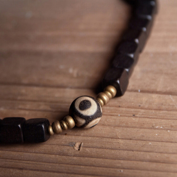Pulsera de pareja de paz de cobre con cuentas Dzi de madera de ébano