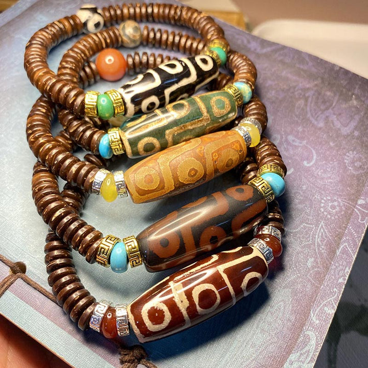 Pulsera de riqueza de cuentas Dzi tibetanas de nueve ojos con Buddha Stones