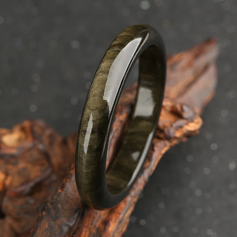 Brazalete de protección de obsidiana con brillo dorado y Buddha Stones