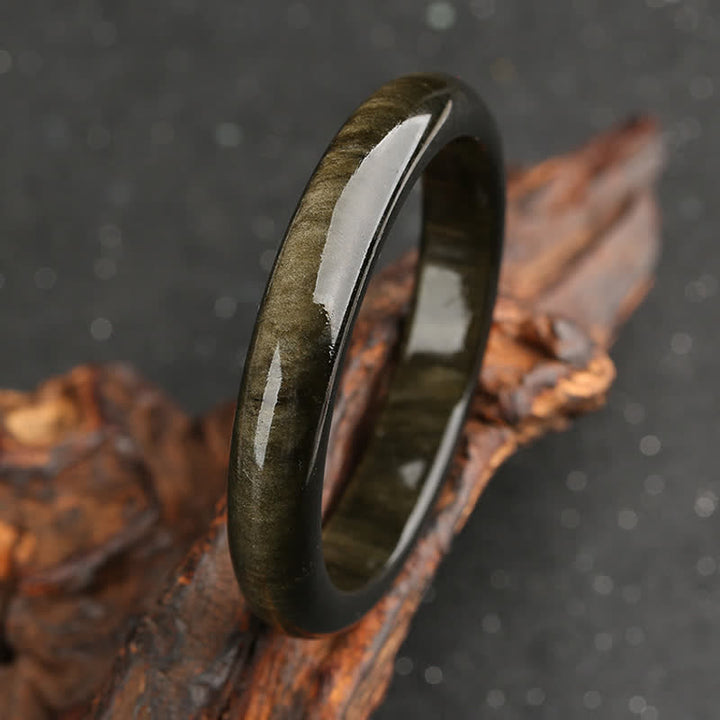 Brazalete de protección de obsidiana con brillo dorado y Buddha Stones