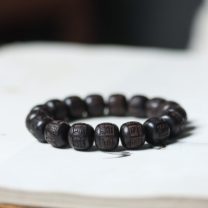 Pulsera de equilibrio grabada con Buddha Stones , madera de ébano del Tíbet, Om Mani Padme Hum