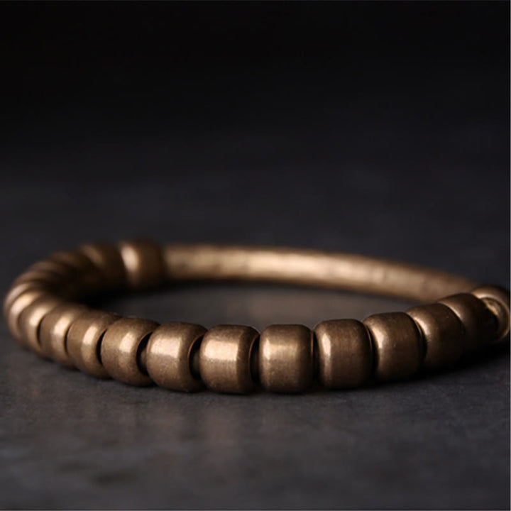 Pulsera de la riqueza de la suerte con cuentas de cobre y latón de diseño simple de Buddha Stones