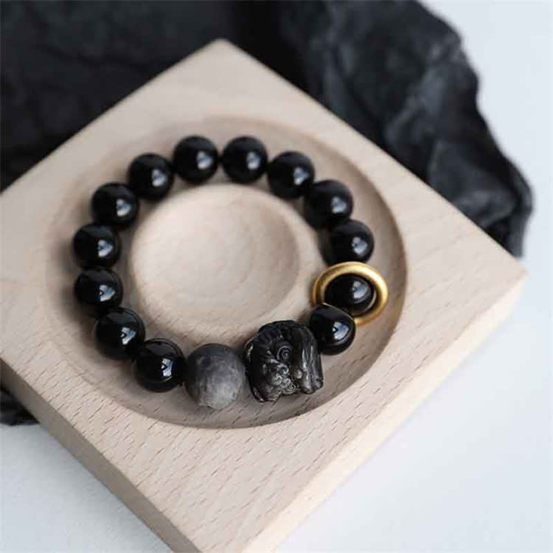 Pulsera de fuerza de león de obsidiana con brillo plateado de obsidiana negra