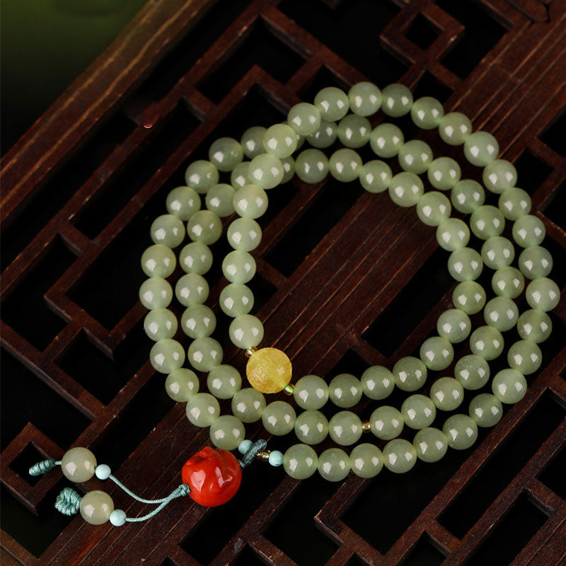Pulsera de prosperidad de Buda sonriente de ámbar y ágata roja de jade