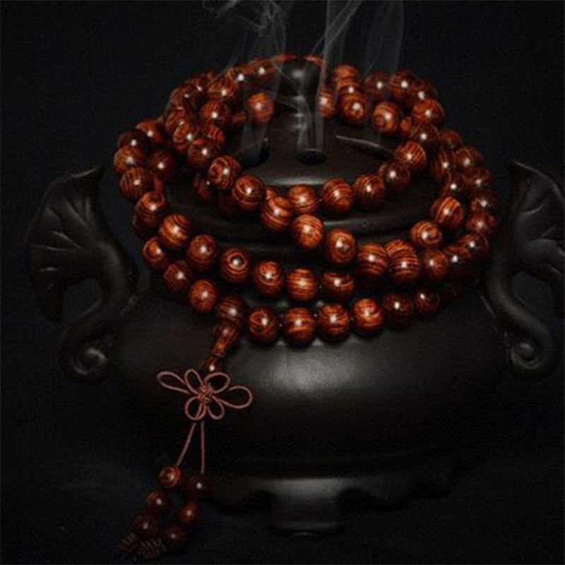 Pulsera cálida de palisandro tibetano con Buddha Stones (tipo aleatorio)